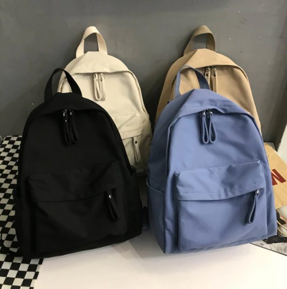 neutral solid color backpack