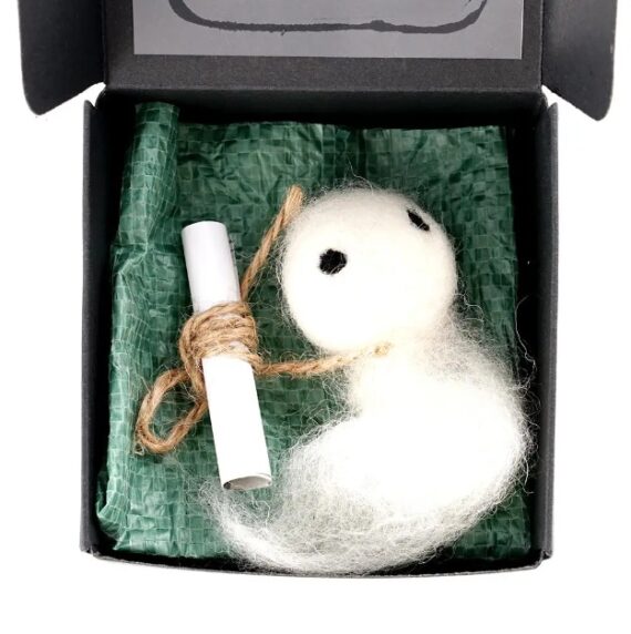 Charming 'Adopt A Ghost' decorative piece with scroll detailing ghost's information