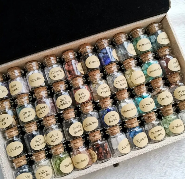 Assortment of 48 natural crystal bottles in Witch's Crystal Vault.